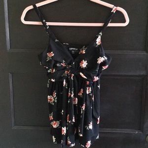 Express black tank with flowers